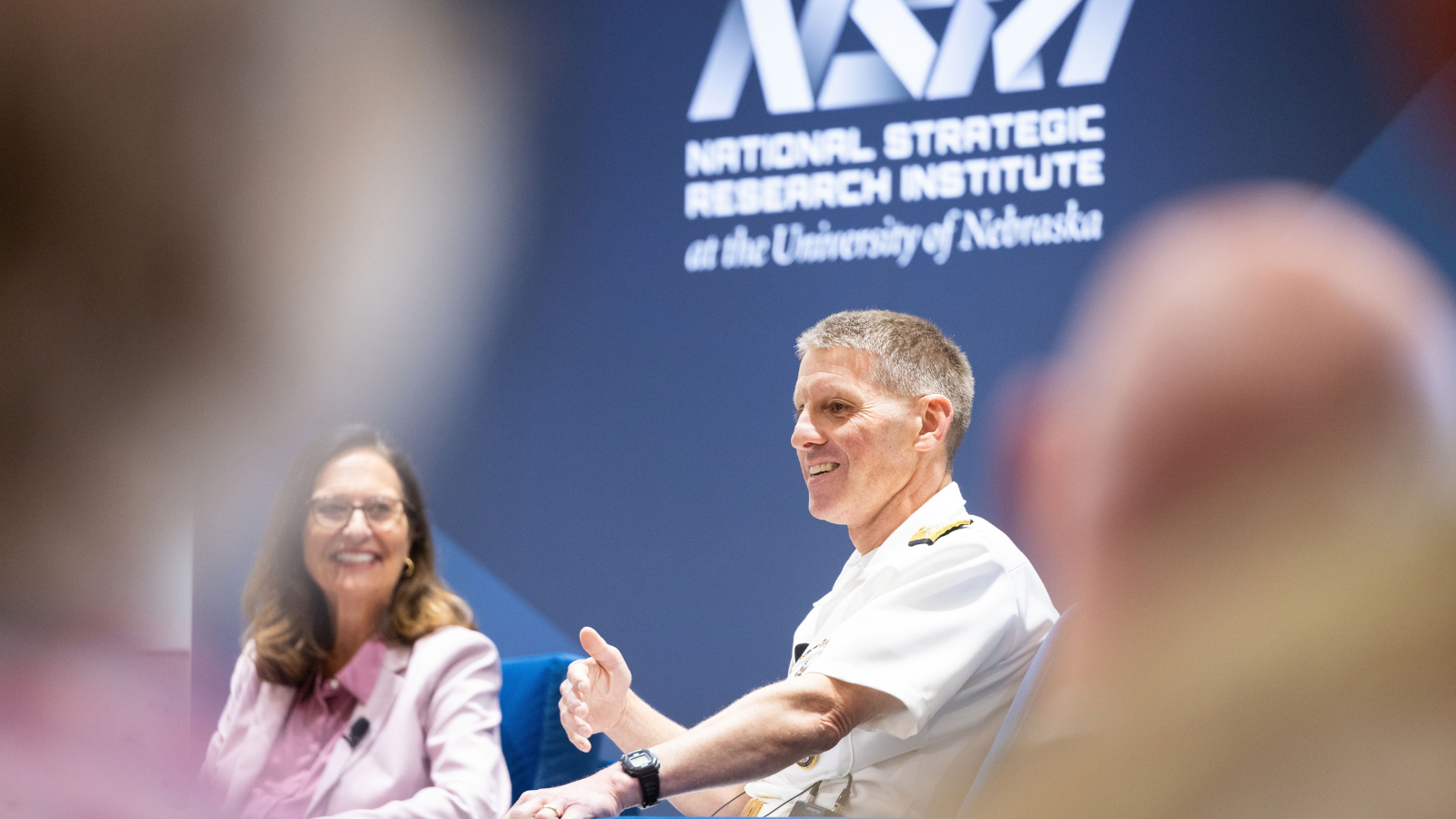 During the NSRI Research Showcase strategic dialogue, ADM Rich Correll, Commander of U.S. Strategic Command, shares operational priorities for future national security research. U.S. Senator Deb Fischer looks on as the discussion — facilitated by University of Nebraska System President Dr. Jeffrey P. Gold — underscores the urgent demand for coordinated innovation across the nation’s defense enterprise and with leading academic institutions. September 8, 2026, University of Nebraska–Lincoln East Campus Union, Lincoln, Nebraska. 