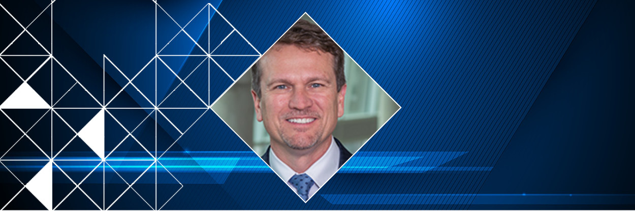Marty Sikes headshot graphic with blue abstract background