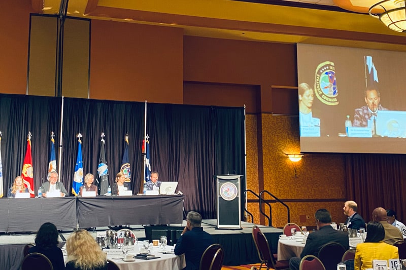 Dr. Christopher Yeaw (far right on stage), NSRI associate executive
                            director, introduces a discussion panel entitled “Strategies
                            for deterring two nuclear-armed peer competitors” at the
                            USSTRATCOM Deterrence Symposium in July 2022, Omaha,
                            Nebraska. U.S. Air Force photo by TSgt. Taylor Drzazgowski.